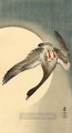 Ganso de frente blanca volando visto desde abajo frente a la luna Ohara Koson Shin hanga